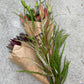 Lilja, leucadendron och grönt